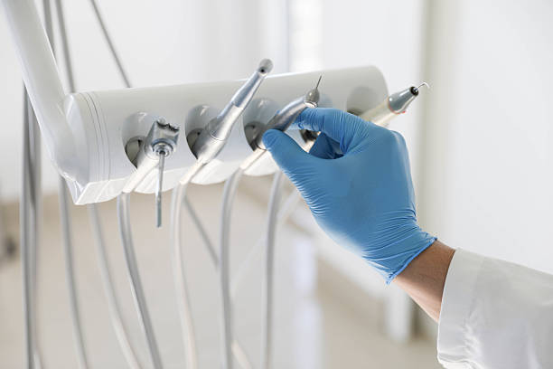 Professional Invisalign Clear Aligners technician working in Island Park, NY